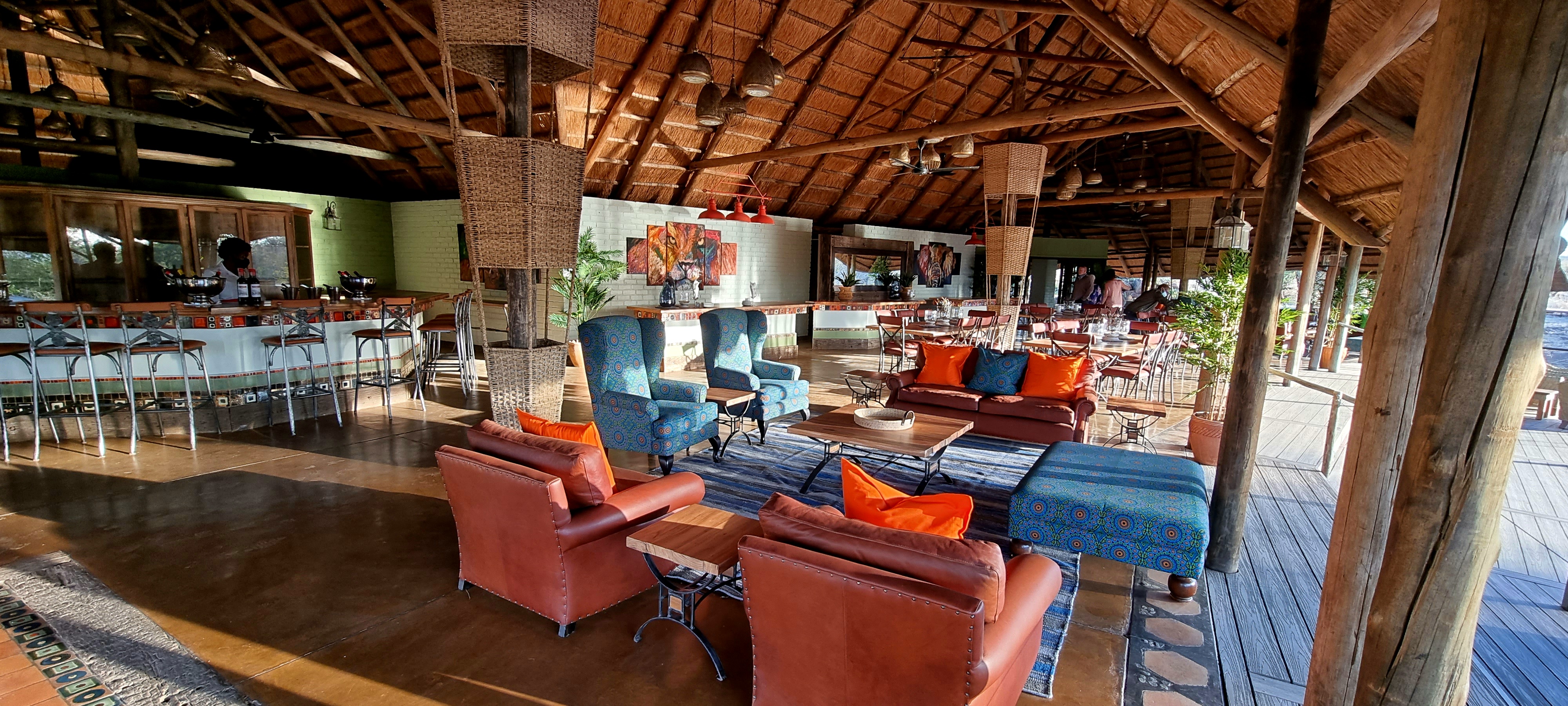 <p>The Wallow, Wild Horizons lounge area is stylish, comfortable, and a serene space with panoramic views of nature for guests to relax and unwind.</p>