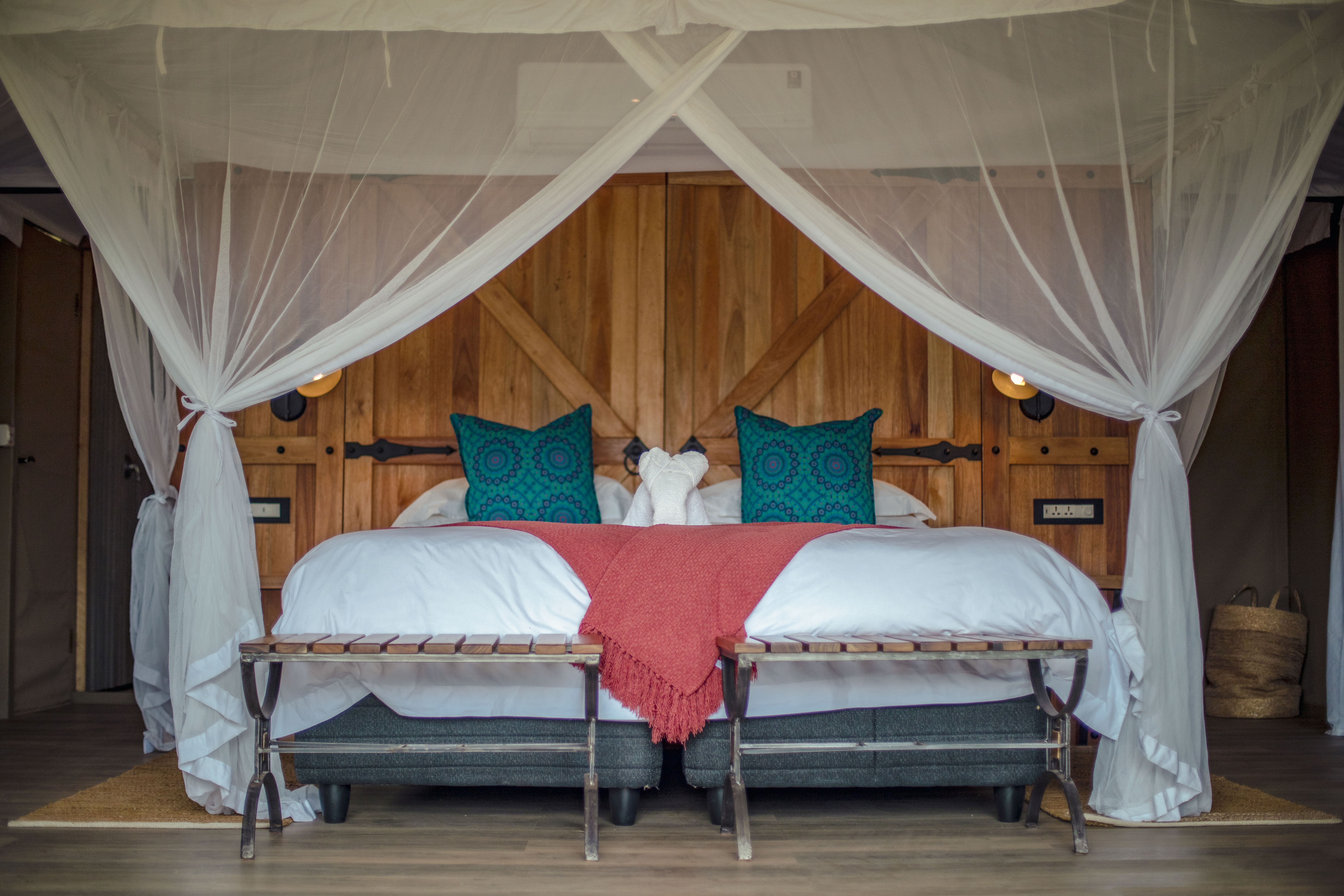 <p>The beds are large and very comfortable offering mosquito nets in the evening&nbsp;</p>