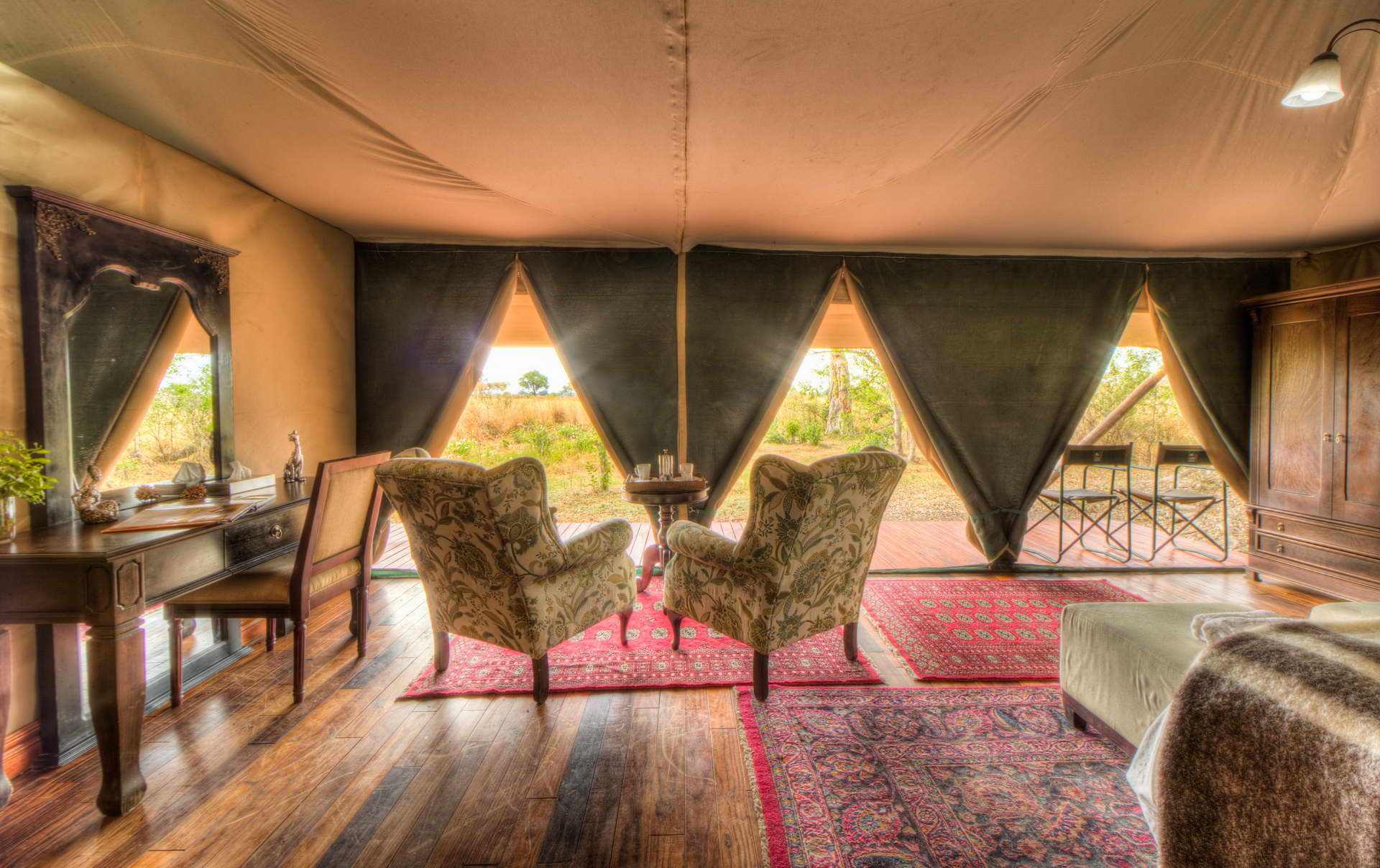 <p>The luxury tents are furnished in a style reminiscent of the classical Out of Africa safari and are designed for you to enjoy the view in comfort!</p>