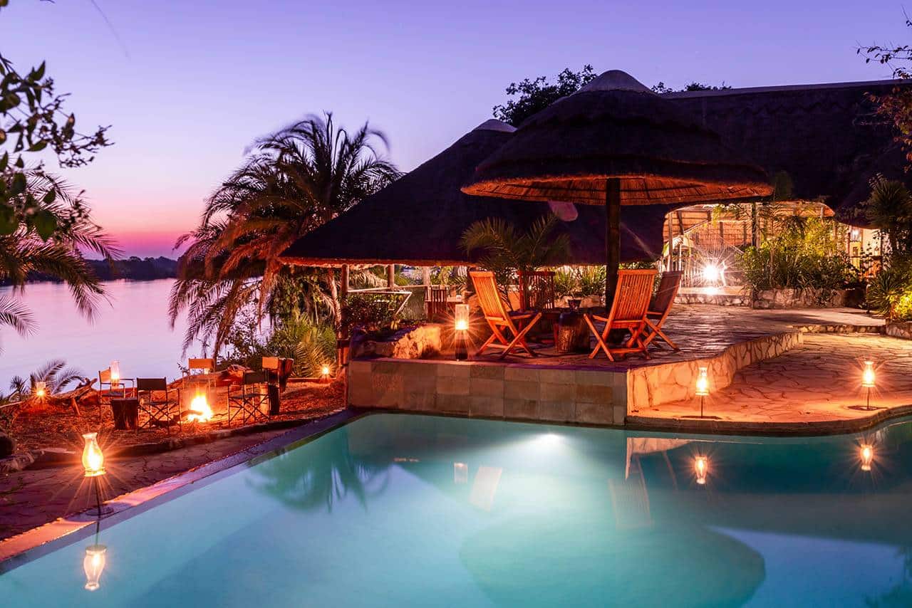 <p>Centrally located you will find:</p>  <p>Our Boma (Restaurant/bar/wifi)</p>  <p>Infinity Pool and separate children&rsquo;s paddling pool</p>  <p>Several decks with a spectacular view over the Kafue river</p>  <p>Food &amp; drinks</p>  <p>Mukambi is famous for its excellent cuisine, friendly staff and highly experienced guides.</p>  <p>Meals:</p>  <p>All accommodation offered at the lodge is on a full board basis (self-catering not permitted). We have a set 3 choice set menu but we do meet all dietary requirements i.e vegan, vegetarian, halaal, gluten, lactose etc.</p>  <p>Breakfast: A choice menu including amongst others full English breakfast, eggs Benedict, cereal and fresh fruit buffet, pastries, coffee, tea, hot chocolate or juice.</p>  <p>Lunch: a fixed menu is served which consists of a warm meal served with a meat (Beef, Pork,<br /> Chicken or Fish) and either rice, potatoes or pasta and 2 different salads.</p>  <p>Dinner: A 3 choice menu including a vegetarian option is on offer every night.</p>  <p>Bar &amp; drinks:</p>  <p>All drinks are included in the Mukambi Safaris all-inclusive packages. On our full-board rates they are extra.</p>